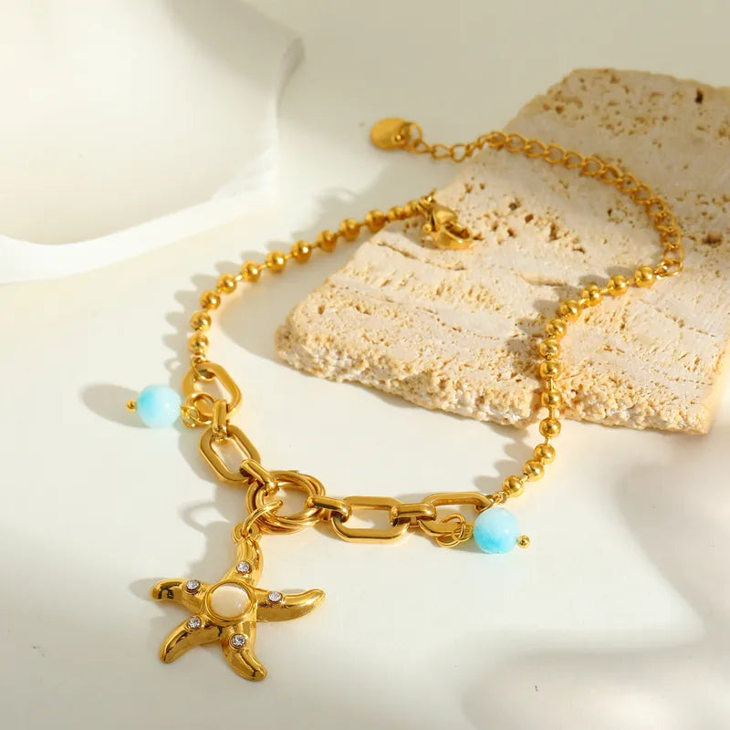 Star shaped Pendant Necklace with crystals and beads 18 K Gold Plated Stainless Steel